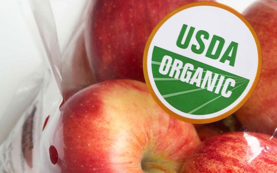 USDA Organic label is seen on a bag of gala apples.