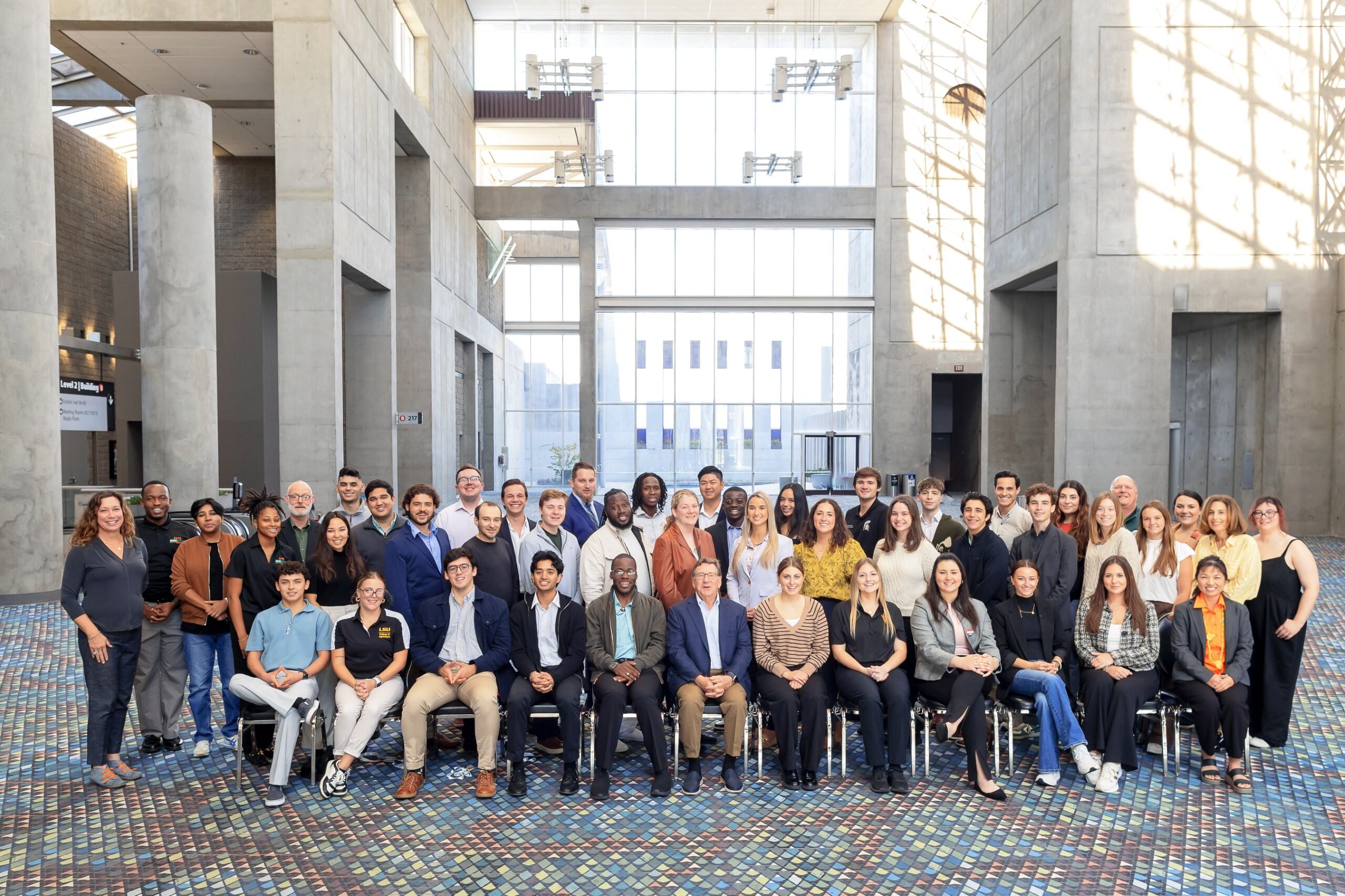 2024 IFPA Jay Pack Award Winners posing and smiling in a group, first row sitting and two rows standing behind 2024 IFPA Jay Pack Award Winners posing and smiling in a group, first row sitting and two rows standing behind