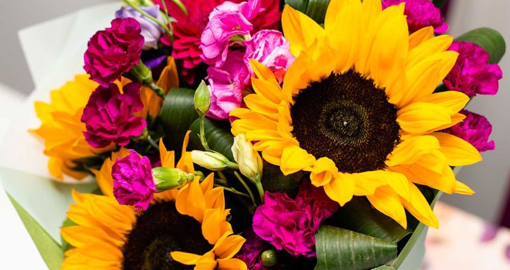Sunflower spring bouquet. Flower arrangement of various flowers in different vivid colours.