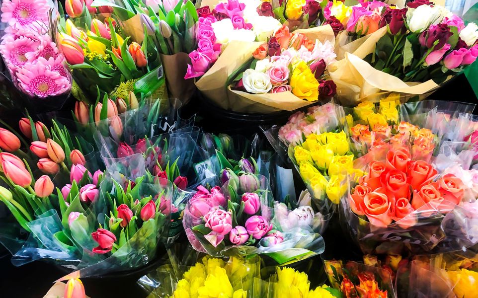 Close up shot of various bunches of flowers available at a supermarket
