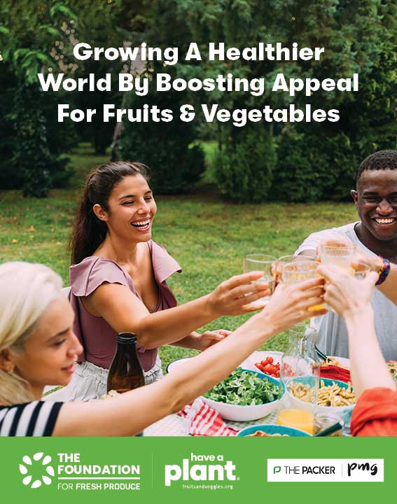 A group of people enjoying a picnic in the part toast at a picnic table. The words: Growing a Healthier World by Boosting Appeal For Fruits & Vegetables is above their heads.