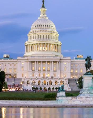Panorama of the United States Capitol, seen from the the Capitol Reflecting Pool, Washington DC, USA.