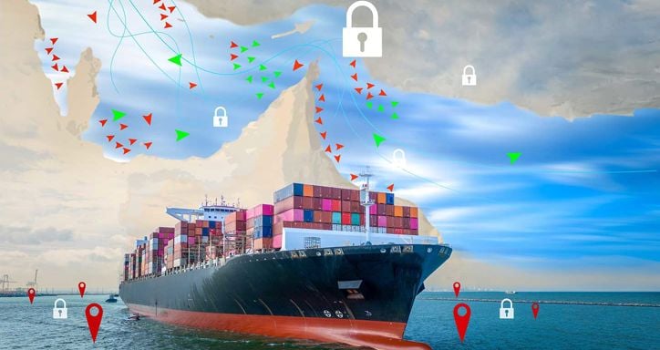 A cargo ship below a digital map overlay with shipping routes and security icons.