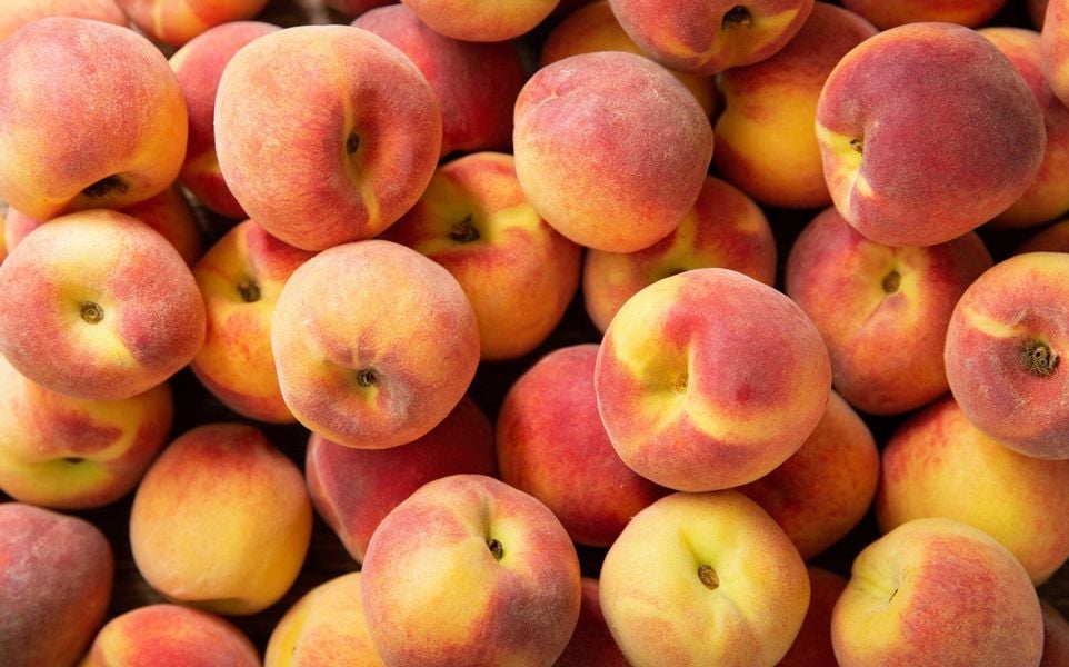 Macro shot of many peaches