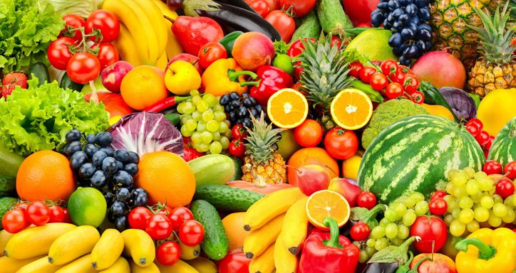 Large pile of various fruits and vegetables